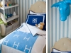 Animal head, tufted headboard and other boy's bedroom decor ideas via lilblueboo.com 