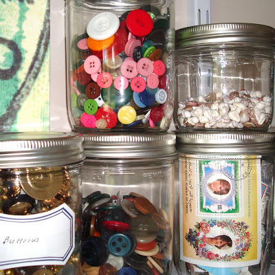 Studio Envy Jars of buttons and stamps via lilblueboo.com