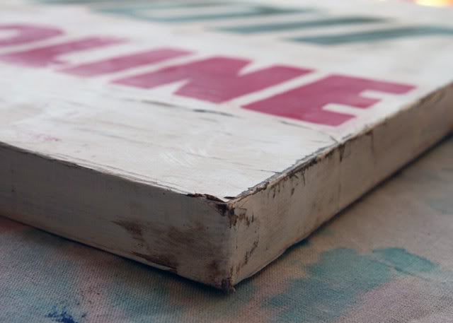 How to make a distressed vintage sign using canvas. DIY tutorial via lilblueboo.com