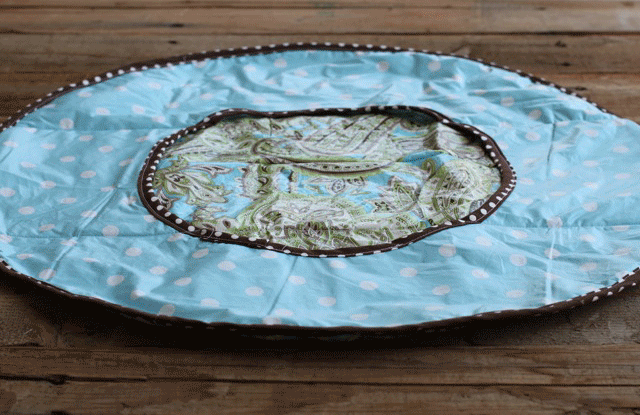 How to make a round diaper changer from a vinyl tablecloth (plus free pattern downloade) via lilblueboo.com