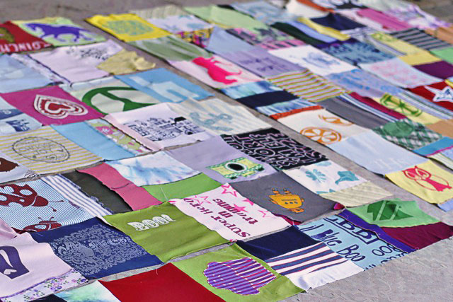 How to make a memory quilt from baby blankets, clothes and t-shirts. DIY tutorial 14 via lilblueboo.com