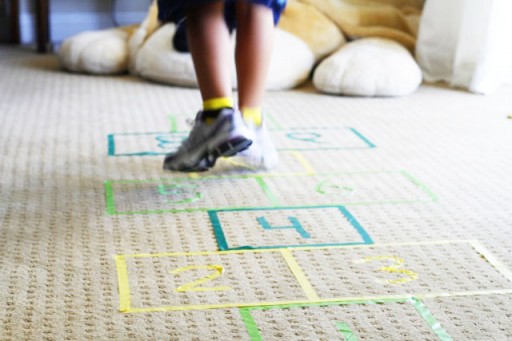 Outdoor and indoor games for kids DIY tutorial hopscotch via lilblueboo.com