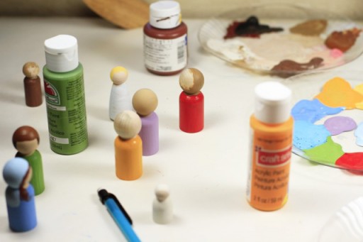 Making Handpainted Peg Dolls via lilblueboo.com