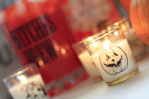 DIY Halloween Party Decor Ideas - Glass Clings on Votives via lilblueboo.com