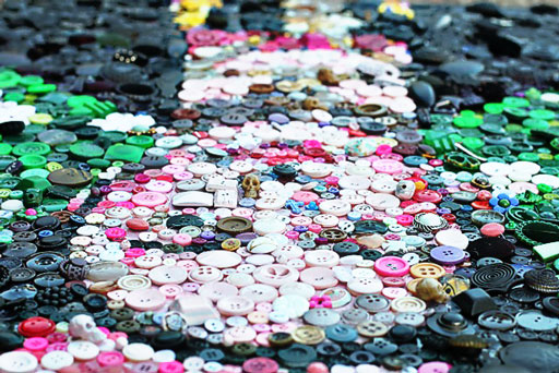 Button Art via lilblueboo.com (click through to see the "DIY How To" HD time lapse video)