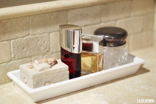 Bathroom organization ideas - corraling clutter - via lilblueboo.com #bathroom #organization