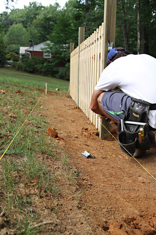 how to build a picket fence on a slope