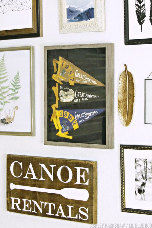 Using a shadow box to display vintage items in a gallery wall 