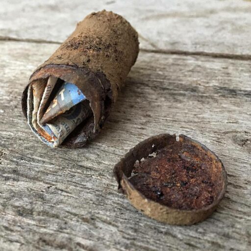 This little metal canister was found in the crawlspace of the house. 