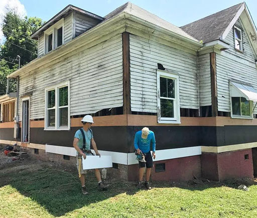 Replacing the Siding on the farmhouse
