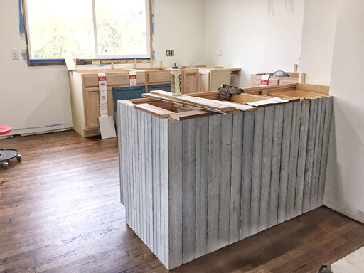 reclaimed wood in a farmhouse kitchen island 