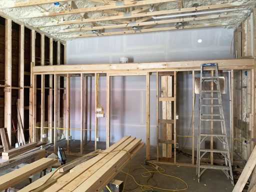 Framing at the new store - Reframing a 100 year old building