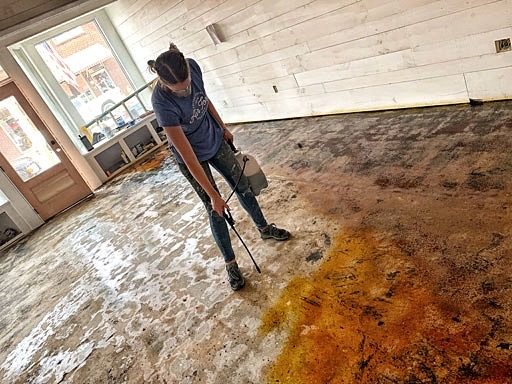 Refinishing the concrete floor - acid stain dark brown
